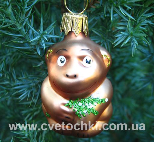 Обезьяна с веточкой